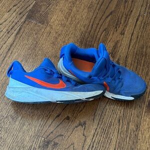 Nike Blue Sneakers with Orange Swoosh